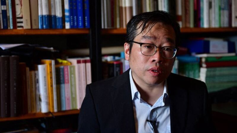 政治学者吴强(法新社)