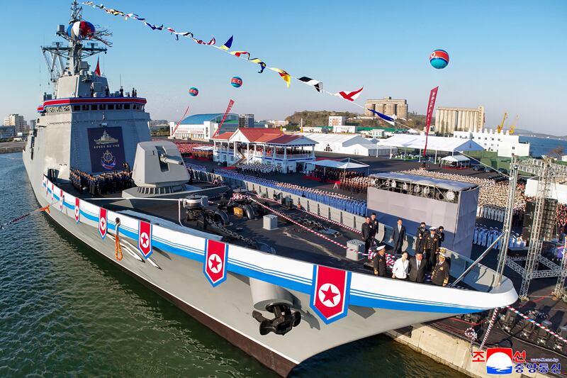 This picture taken on April 25, 2025, and released by the North Korean government shows leader Kim Jong Un and daughter Ju Ae attending the launch ceremony of a newly-built destroyer in Nampo, North Korea.