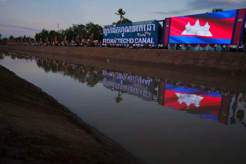 A Cambodian national flag is displayed during a groundbreaking ceremony of China-funded Funan Techo canal in Prek Takeo village, Cambodia, Aug. 5, 2024. (Heng Sinith/AP)
